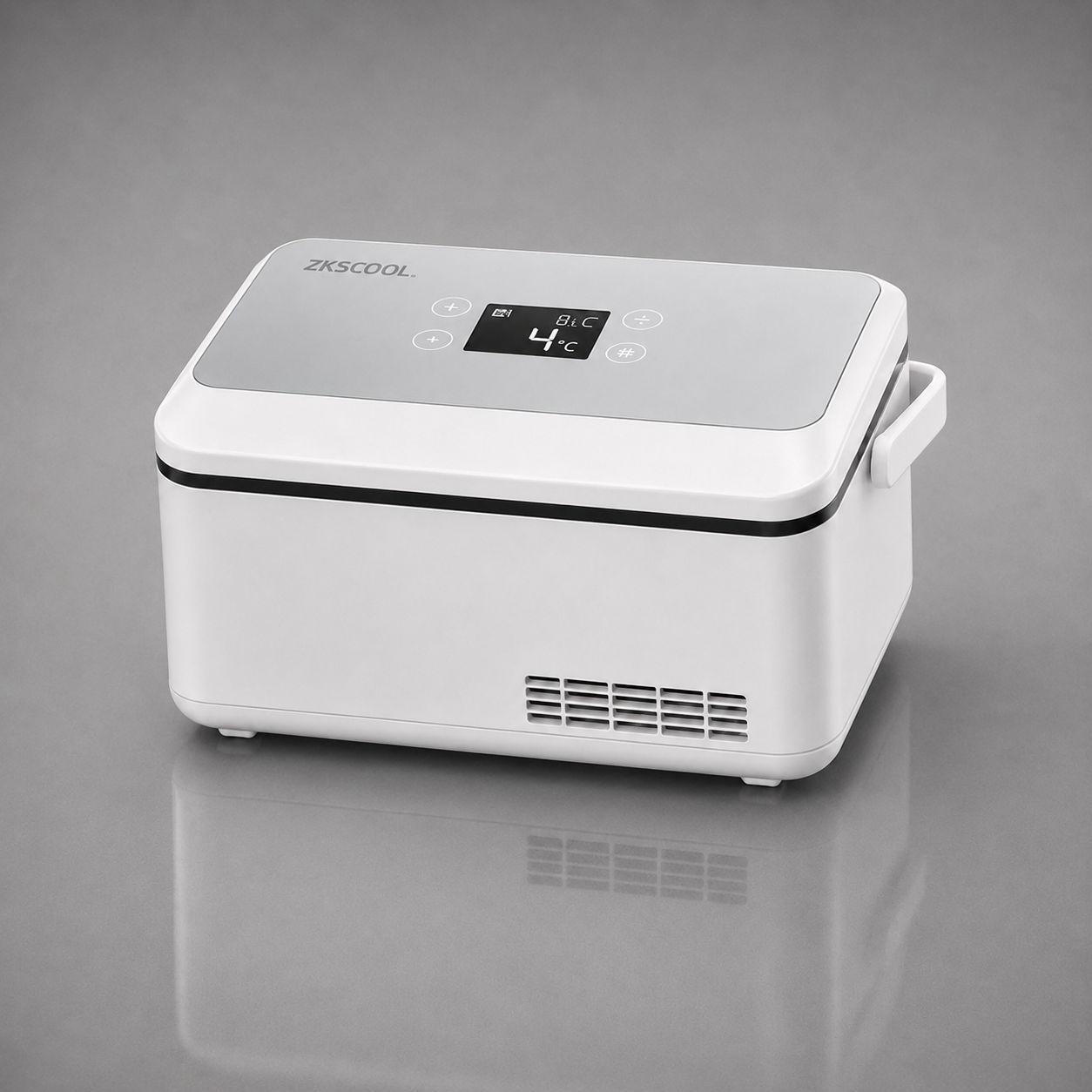 A white ZKSCOOL digital sous vide immersion heater on a reflective gray surface. The device features a white body, a light gray top lid, a small black digital temperature display showing 40°C, and a white carrying handle on the right side.